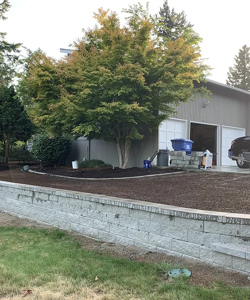Retaining wall and new grass installation in Federal Way 